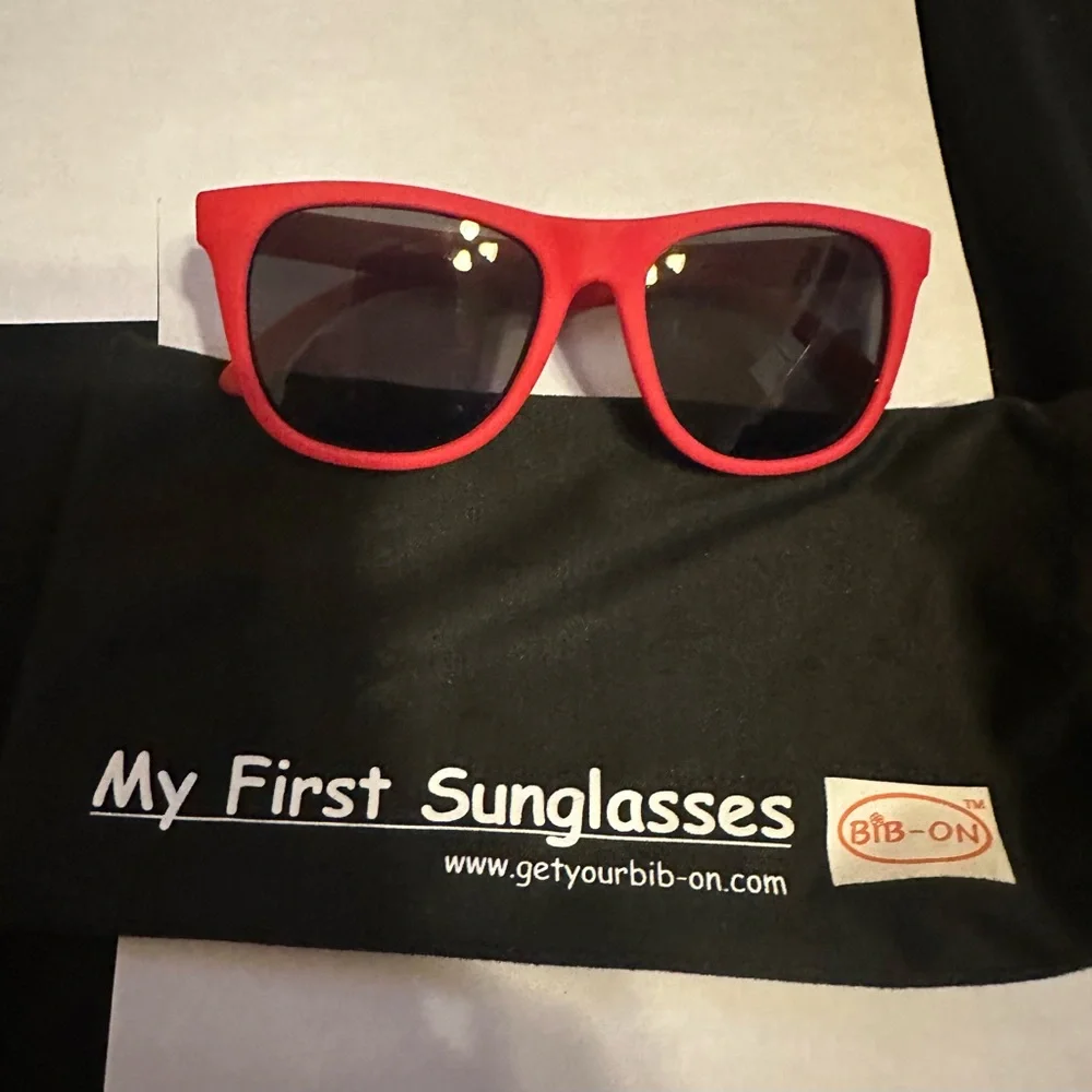 Vibrant Red Sunglasses with Dark Lenses for babies.